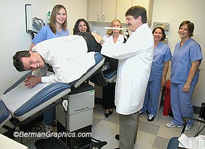 Dr Caushaj with Dr Read and staff